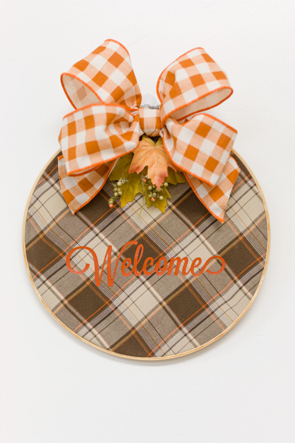 Fall Plaid Embroidery Hoop Welcome Door Hanger with orange plaid bow and leaves