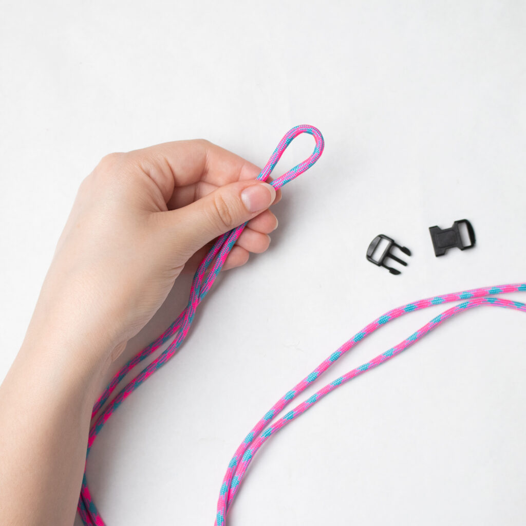 Fold the paracord in half, creating a loop in the center